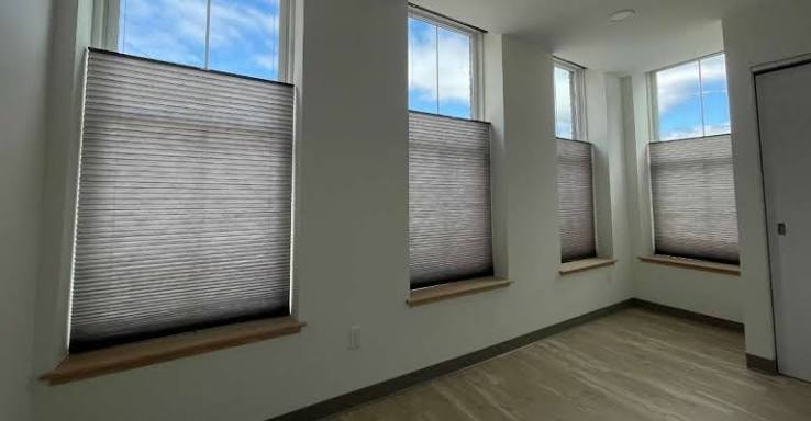 Honeycomb shades in home office